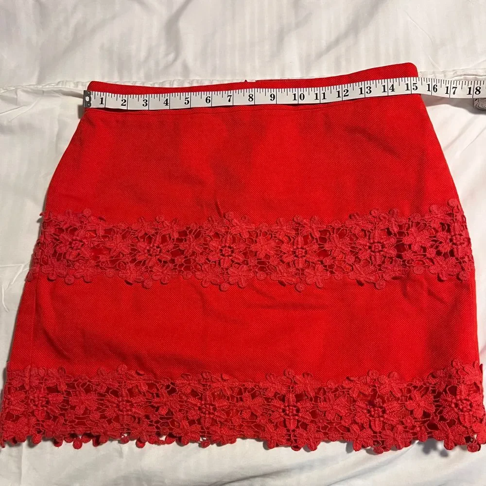 Elegant Red Mini Skirt with Floral Lace Trim Detail - Perfect for Evening Events